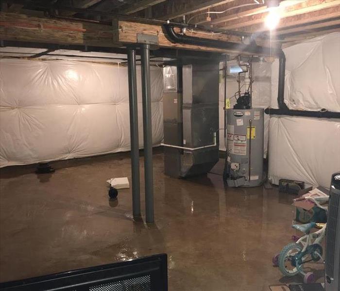 sump pump failure in basement causes flooding
